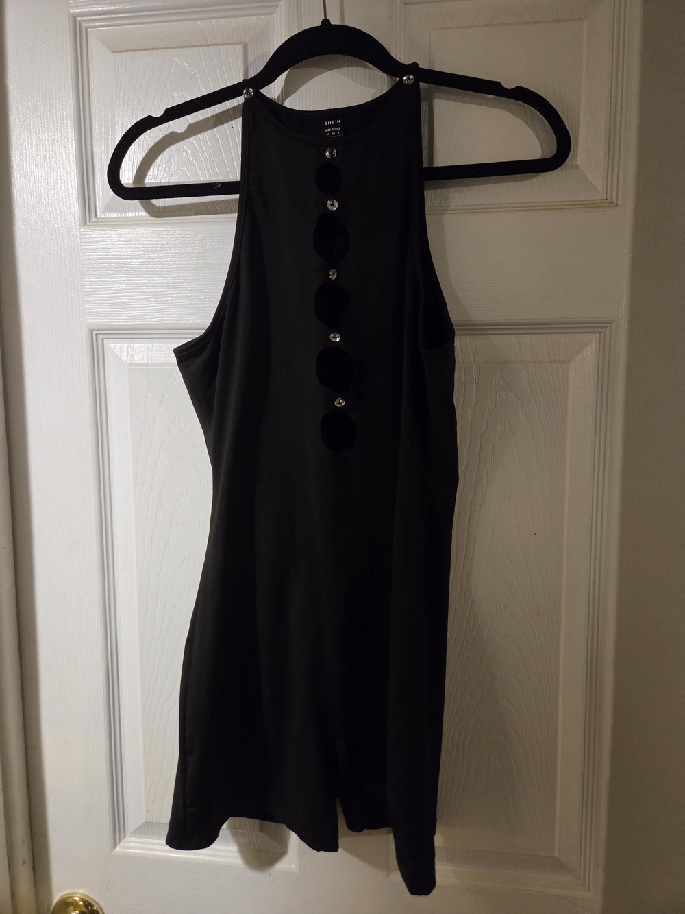 SHEIN Black Sleeveless Romper with Decorative Gem Buttons